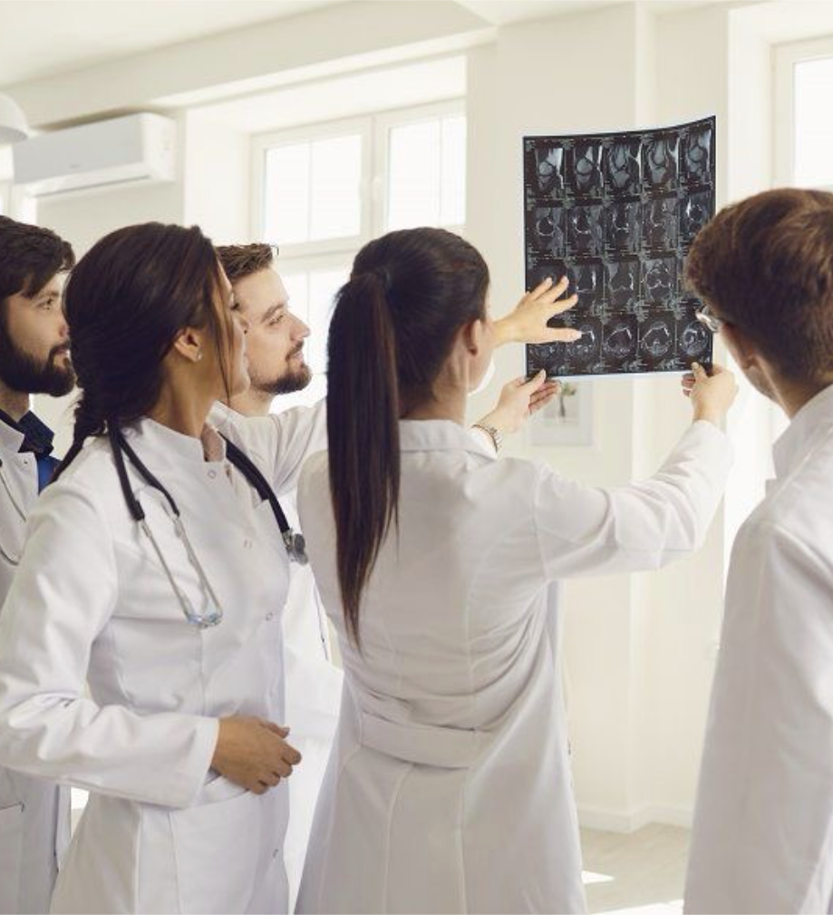 Medical staff reviewing diagnostic scan in clinic